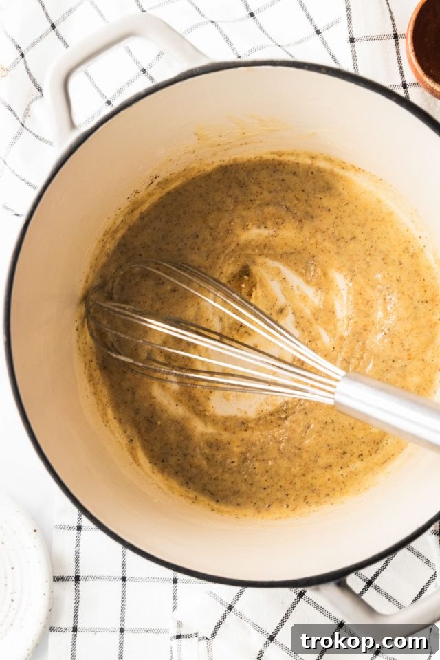 Homestyle White Country Gravy 4 Country Gravy Recipe - photo of the liquid ingredients being mixed in