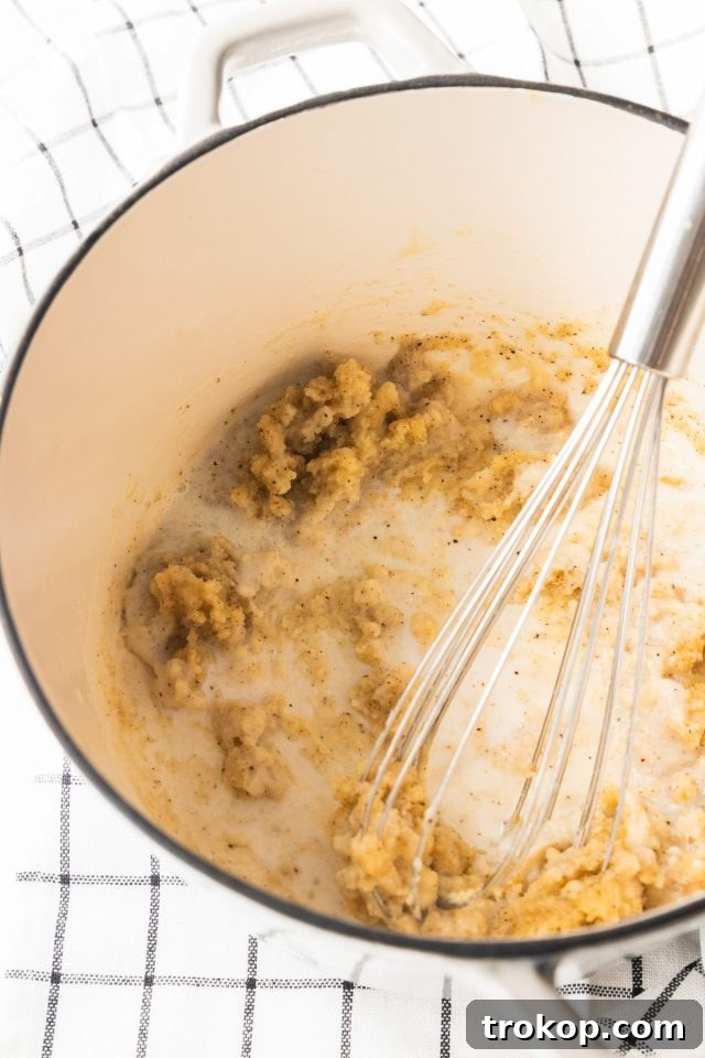 Homestyle White Country Gravy 5 country gravy recipe - photo of the flour being whisked in