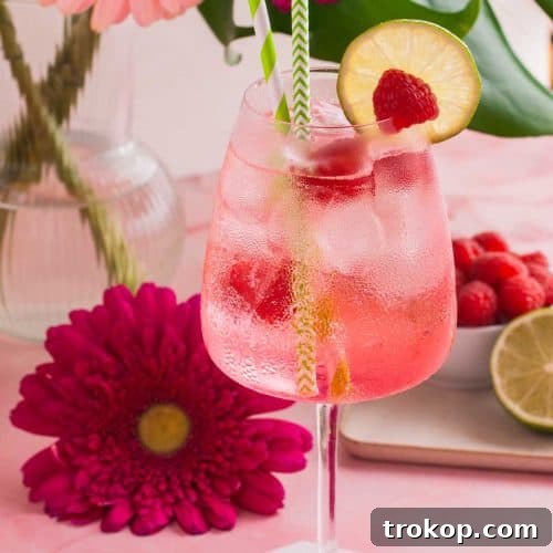 gin and sprite - a pink cocktail drink