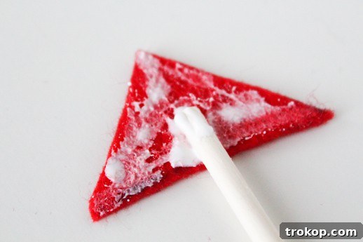 DIY date night valentine arrows - cut out triangle with glue