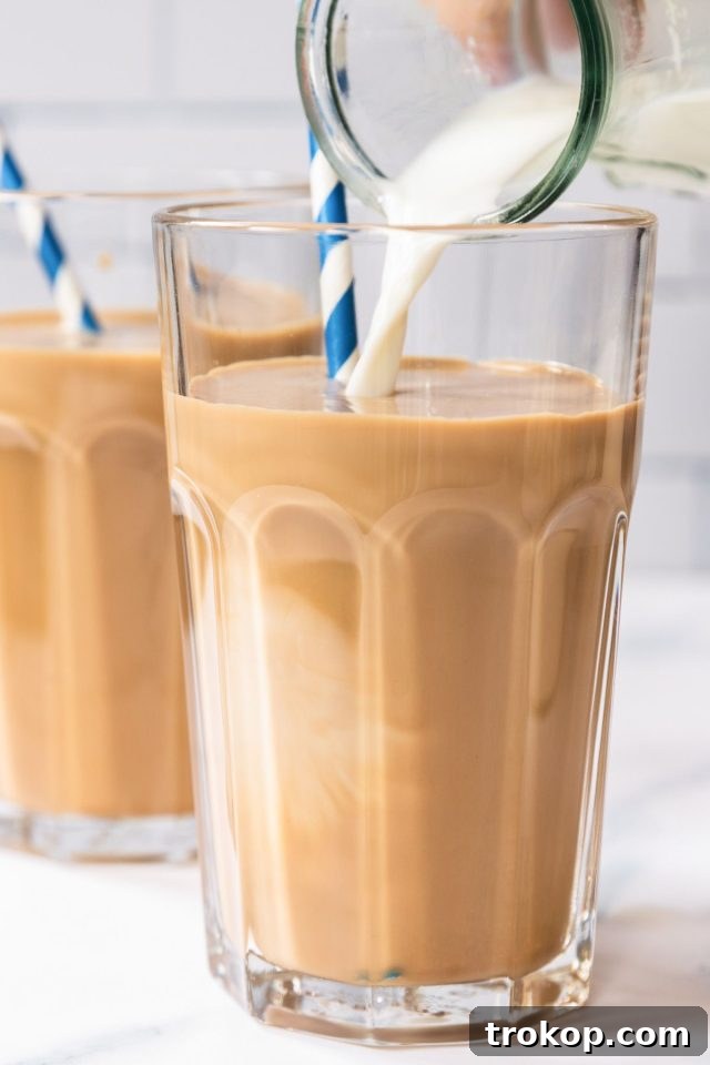 Filling the glass with milk