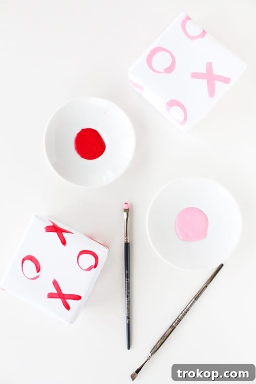 Handmade Hugs and Kisses Gift Wrap 4 DIY xoxo gift wrap with paint and brushes