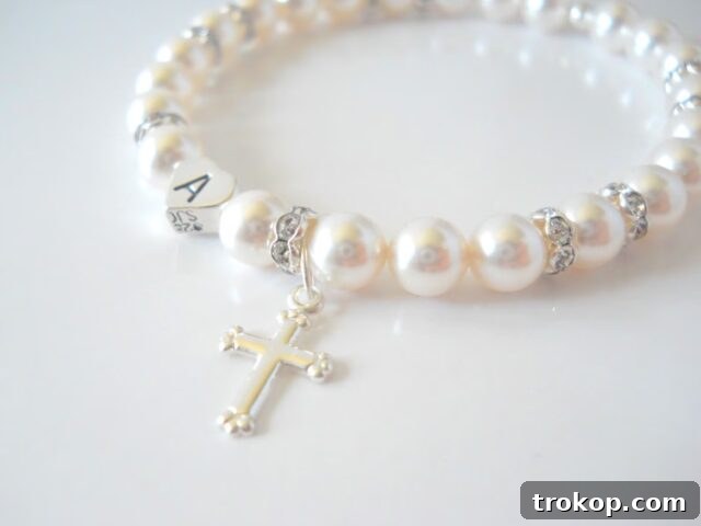 28 Heartfelt Baptism Gifts for a Special Blessing 4 Elegant religious cross bracelet, perfect baptism gift