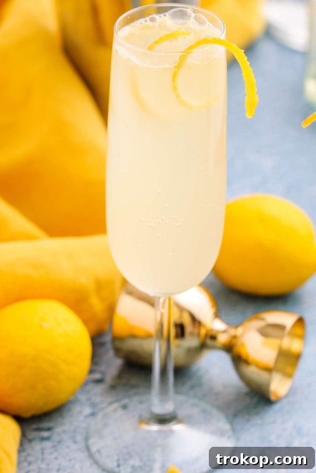 French 76 - a single serving of the elegant vodka and champagne cocktail in a flute, ready to be enjoyed.
