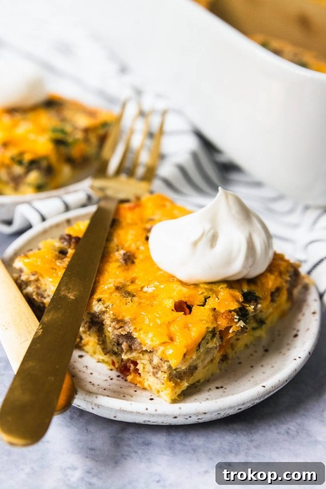 Ultimate Healthy Keto Breakfast Casserole 9 breakfast casserole with sour cream on top