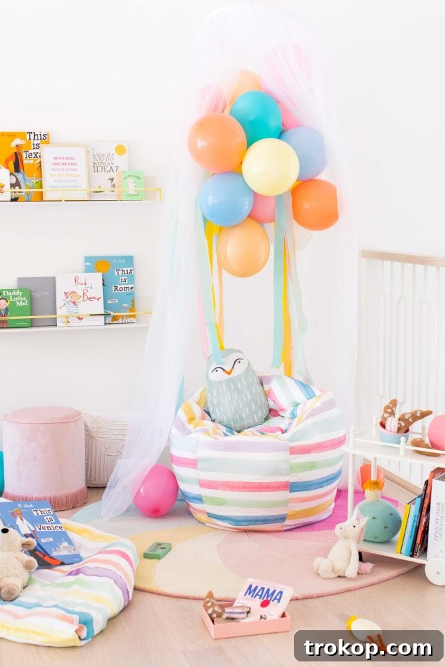 25 Dreamy Bedroom Ideas Little Girls Will Adore 7 Sharing how to make this DIY book nook with a few colorful reading nook ideas to make it your own! #decor #kids #diy #reading by top Houston lifestyle blogger Ashley Rose of Sugar & Cloth