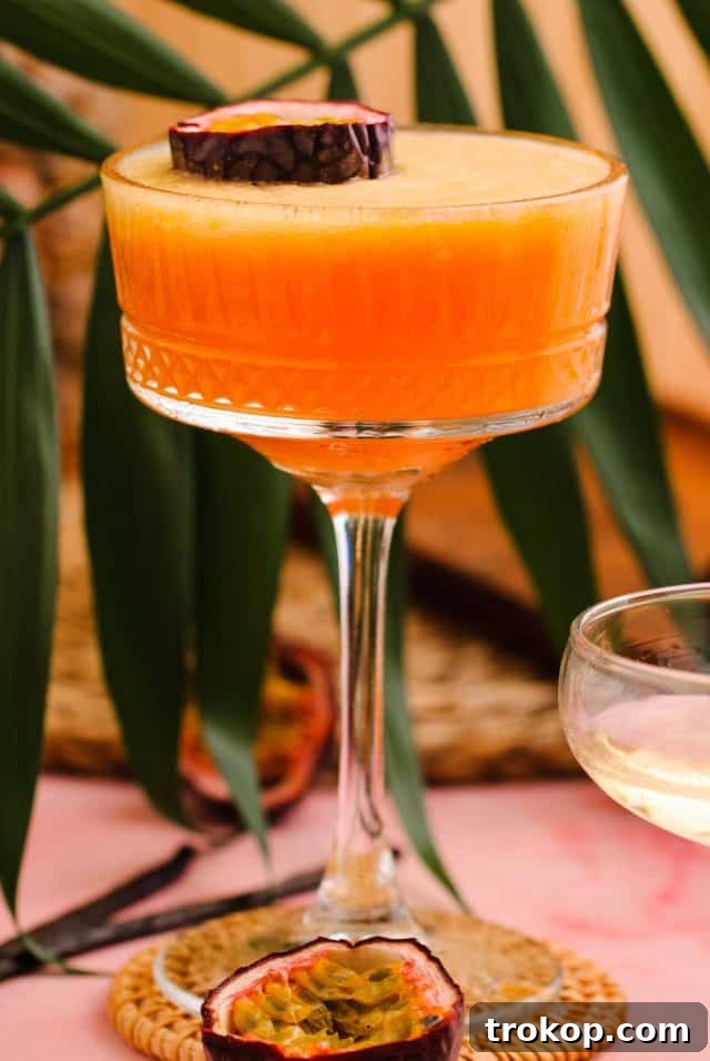 A glass of sweet Passion Fruit Martini