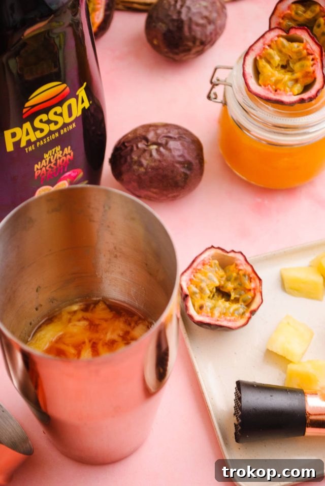 How to make Passion Fruit Martini - pineapple slices in a cocktail shaker