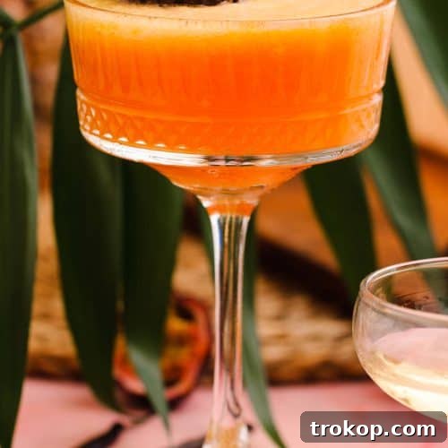 A glass of sweet Passion Fruit Martini