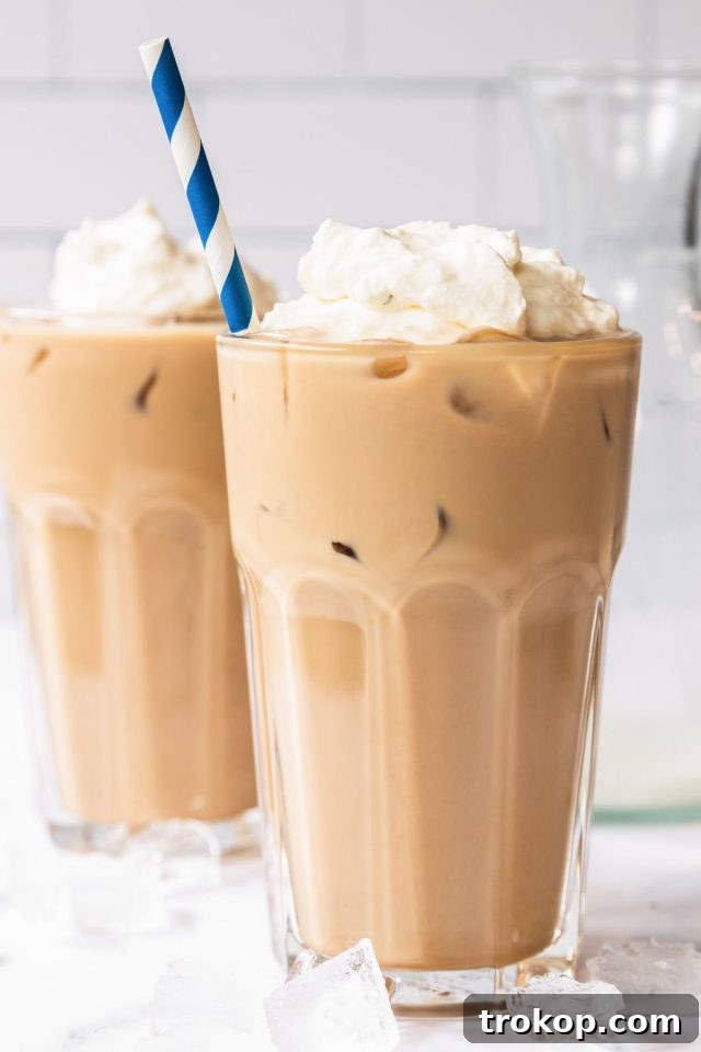 Start Your Day Sweet: 13 Effortless Breakfast Treats 4 Close up of two servings of Iced White Mocha with whipped cream, a copycat recipe from Starbucks