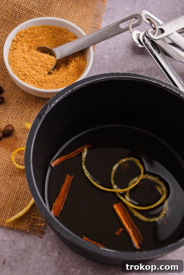 Carajillo The Ultimate Boozy Coffee Recipe 5 heating the rum with the aromatics on a saucepan for the carajillo