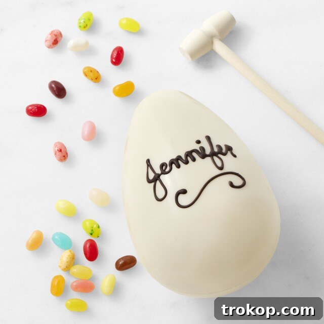 Personalized breakable white chocolate Easter egg filled with jellybeans and a mallet
