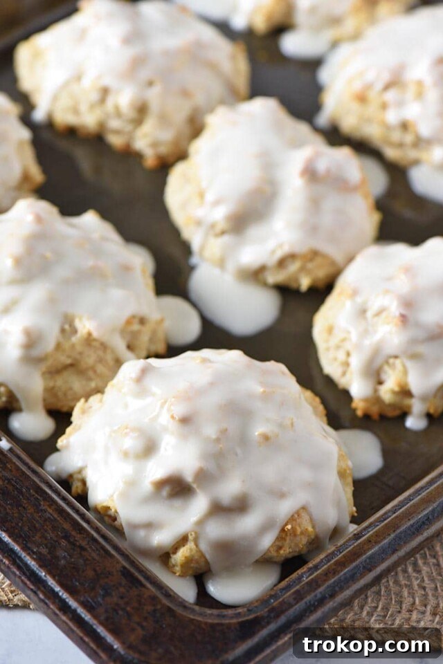 Warm Bisquick Cinnamon Biscuits with glaze