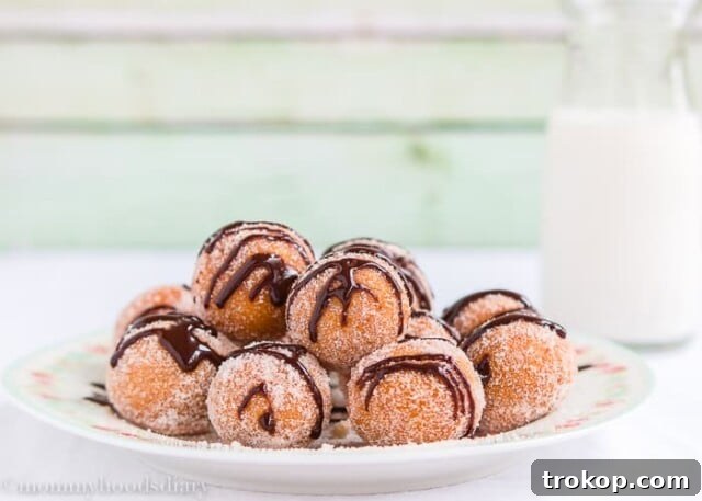 Easy Bisquick Churro Bites with indulgent Chocolate Sauce