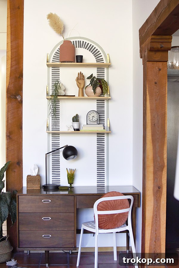 Trendy Line Arch Accent wall design with added shelving