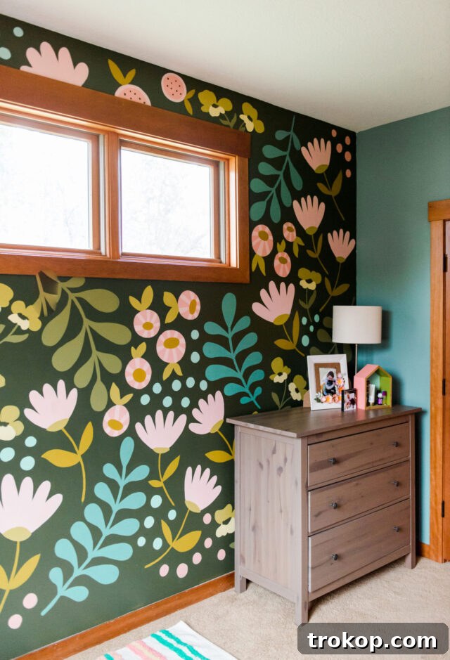 Colorful DIY Flower Accent Wall for a whimsical bedroom