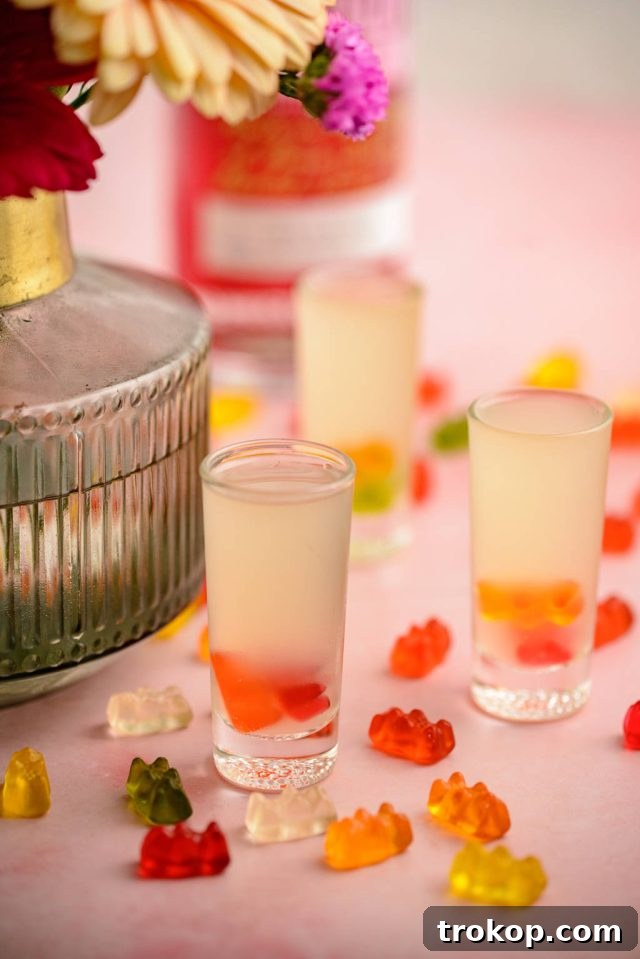 Multiple glasses of colorful Gummy Bear Shots, neatly arranged and ready for serving