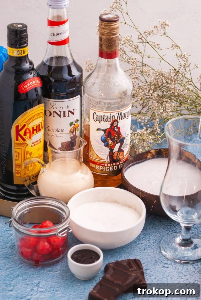 Bushwacker Recipe: Make Your Own Cream of Coconut Cocktail 3 Essential ingredients laid out for making the perfect Bushwacker cocktail at home, including rum, coffee liqueur, chocolate liqueur, milk, and cream of coconut.