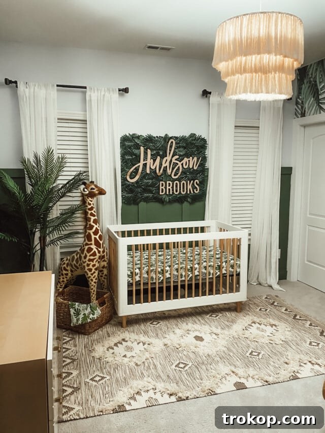 Modern boy's jungle nursery decor