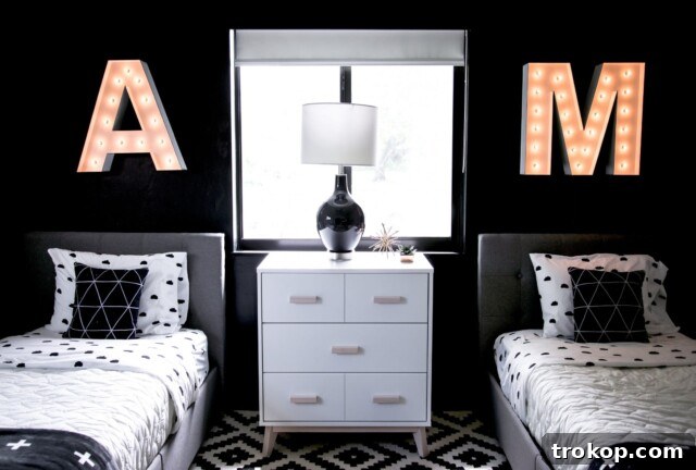 Modern black and white shared bedroom idea for boys