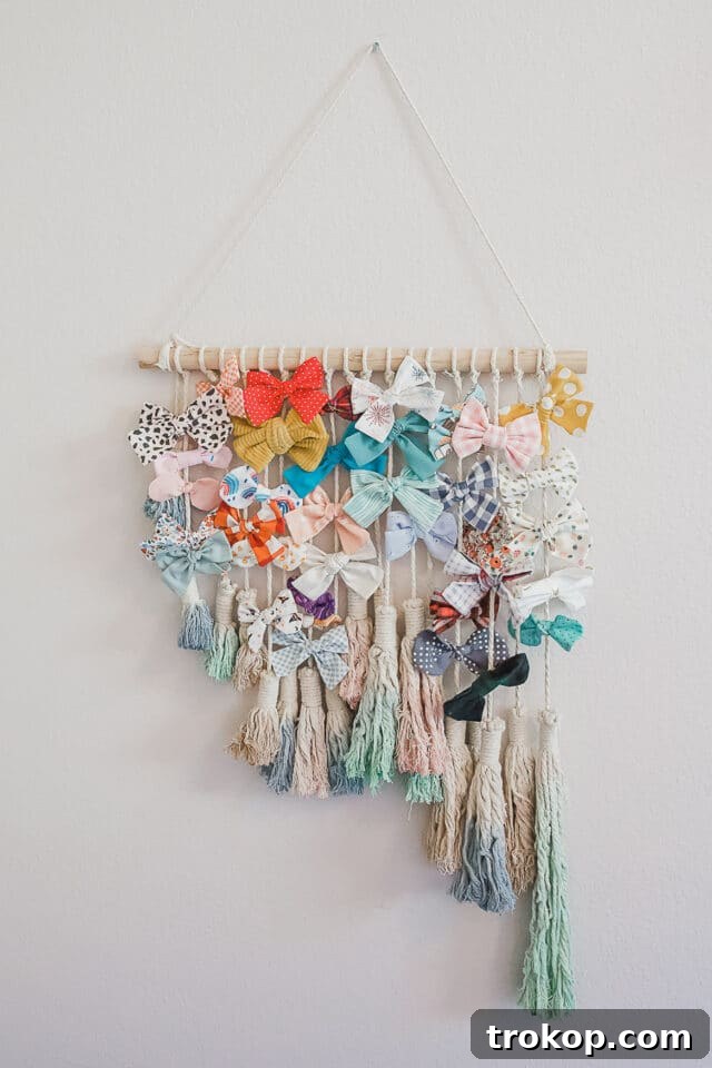 12 Stylish and Clever DIY Hair Bow Organizers 7 Handmade Macrame Bow Organizer for baby or dog bows