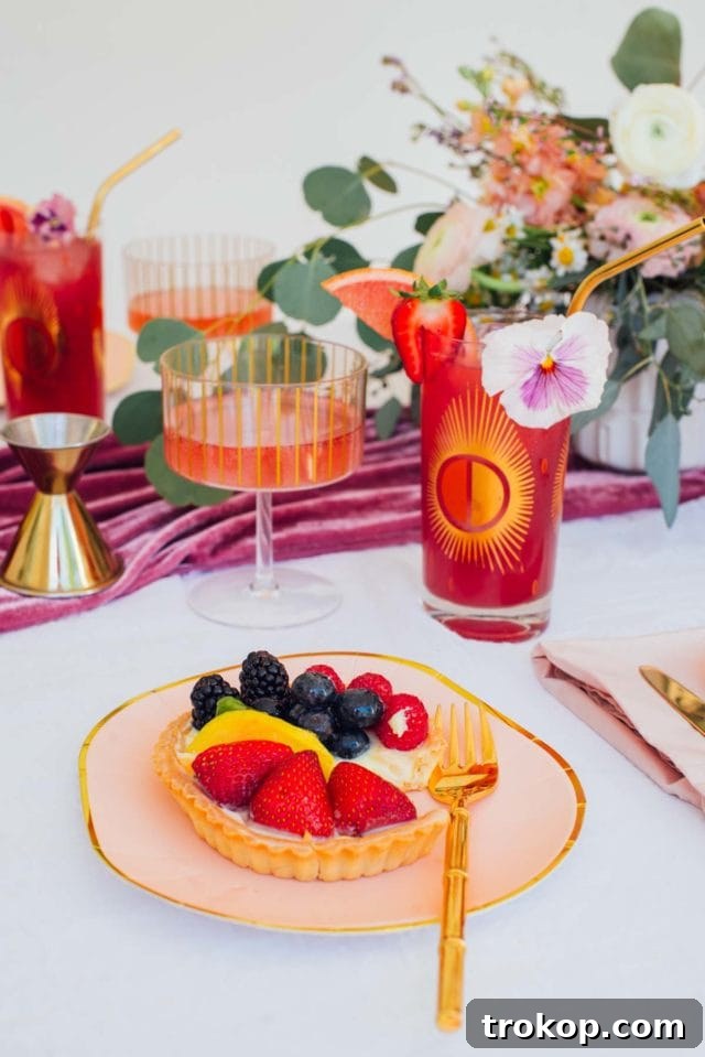 Feasting on Flowers: 19 Unique Recipes 6 Refreshing Sparkling Strawberry Hibiscus Cooler Cocktail