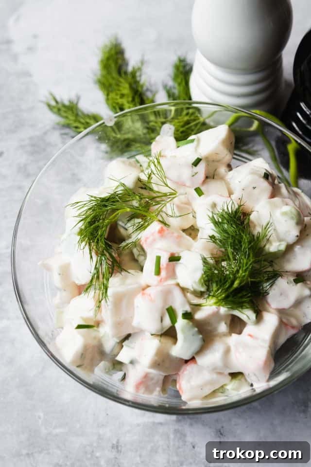Quick and easy crab salad recipe, perfect for a light meal or appetizer.
