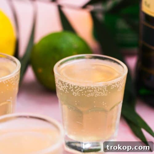 Green Tea Shot: A refreshing whiskey-based drink with fruity, sweet, and sour flavors.