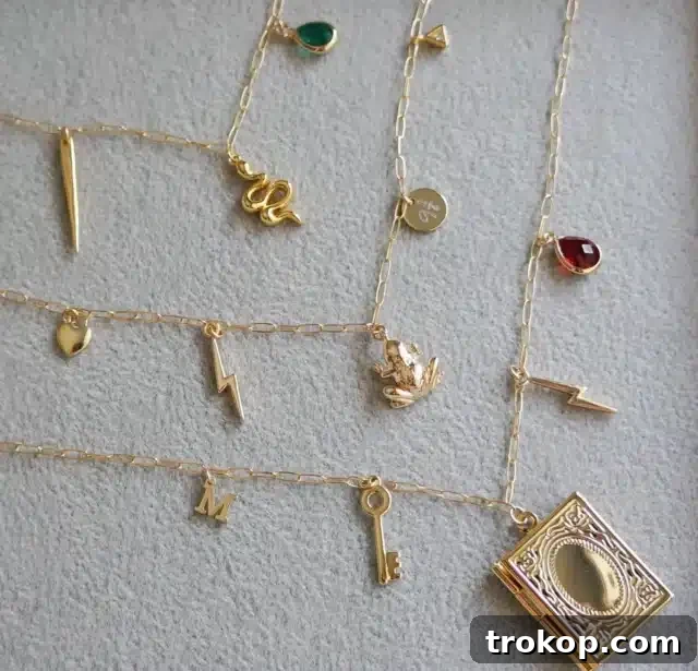 Harry Potter Gifts Every Fan Will Adore 18 Magical Wizarding Necklace with customizable charms on a 14k gold-filled chain.