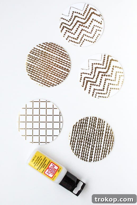Crafting Water-Resistant Paper Coasters 4 Essential materials for waterproofing paper coasters: Dimensional Magic and paper coasters.
