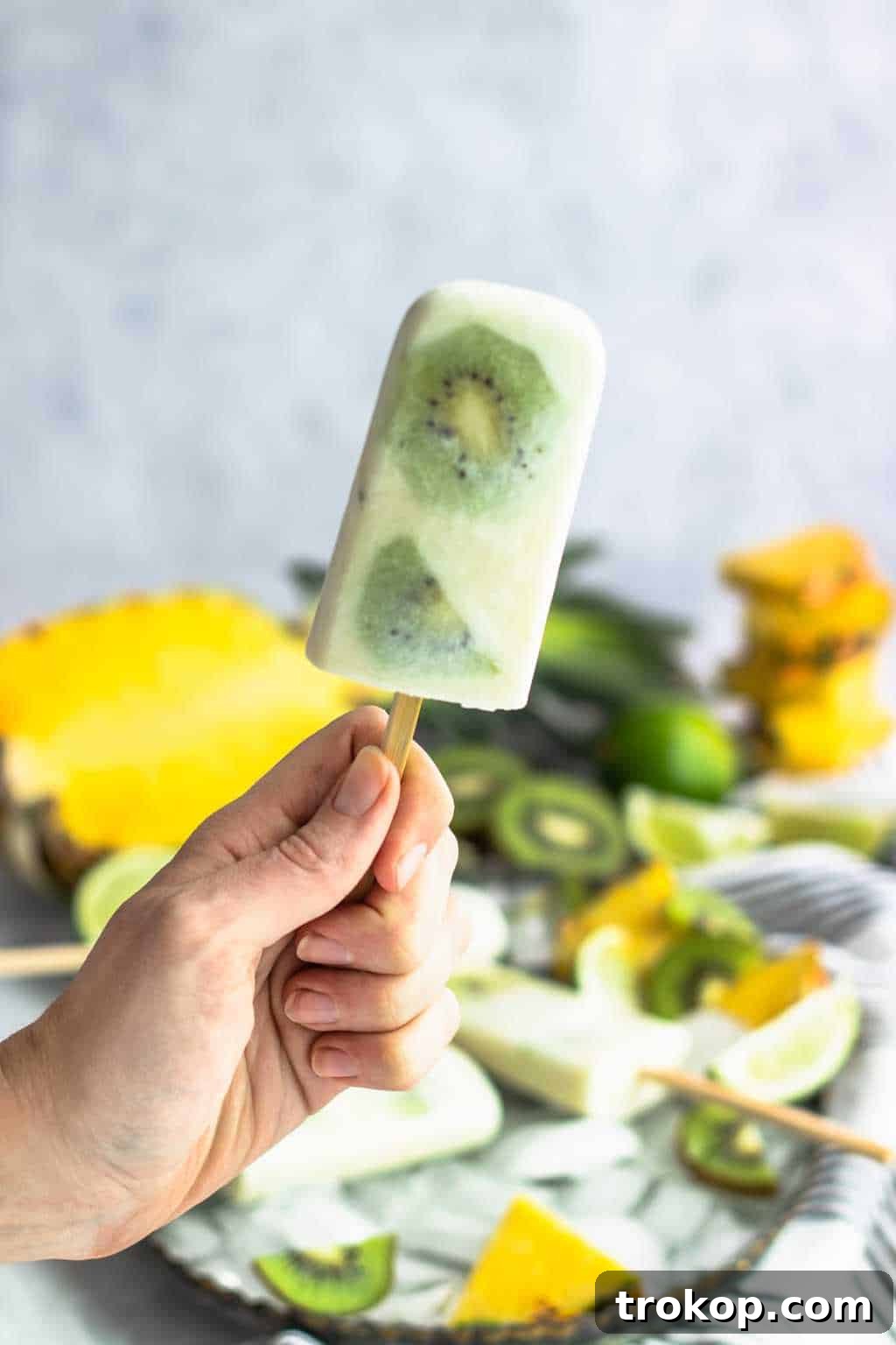 Kiwi Obsession 22 Zesty Treats for Fruit Enthusiasts 3 Tropical Paradise Popsicles Recipe - best way to eat kiwi