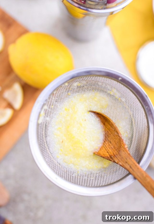straining the lemon juice - easy shots to make