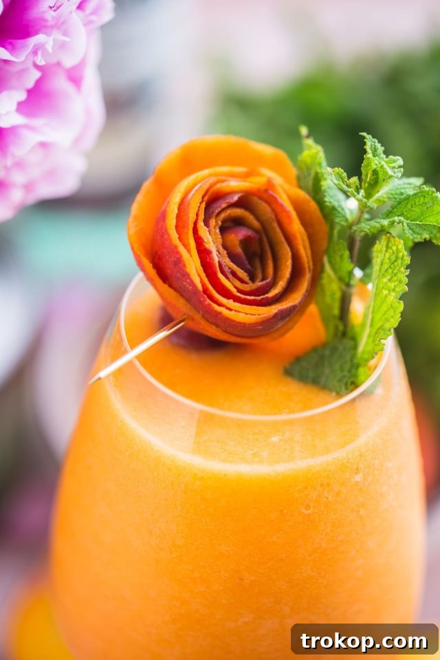 Close up shot of the peach daiquiri cocktail Sugar & Cloth