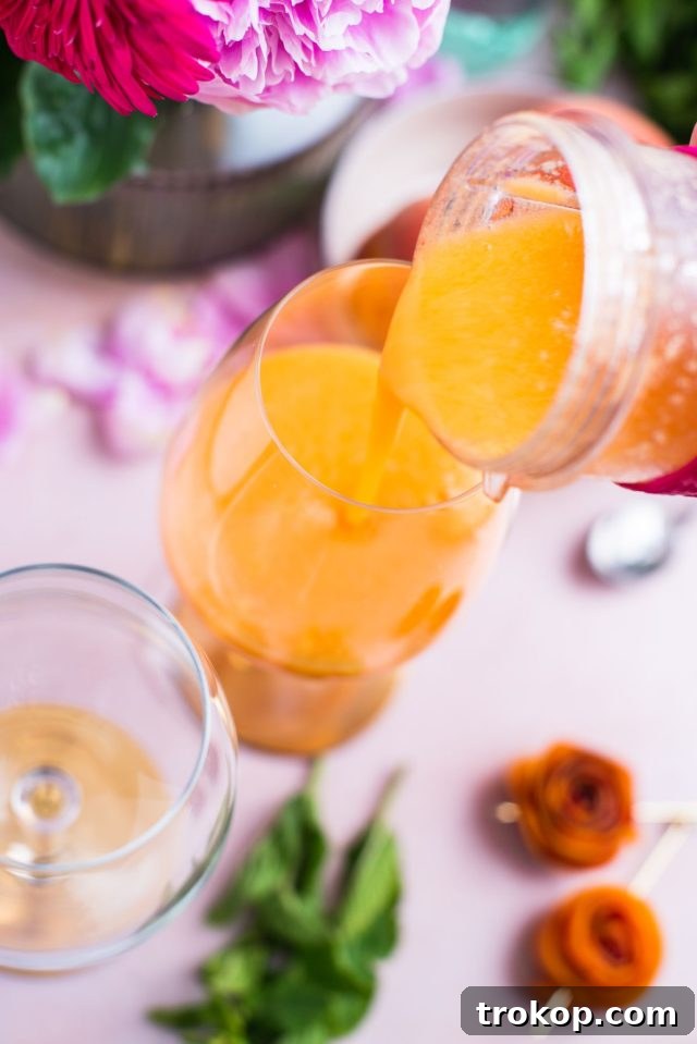 freshly made peach daiquiri drink