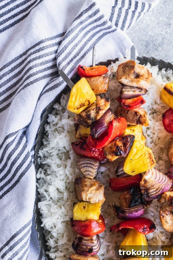Hawaiian Heaven: 25 Effortless Island Recipes 4 Hawaiian Huli Huli Chicken Kebabs on a grill