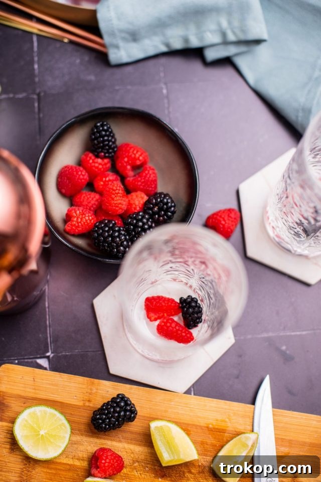 A tall glass filled with berries and crushed ice for the Grateful Dead drink