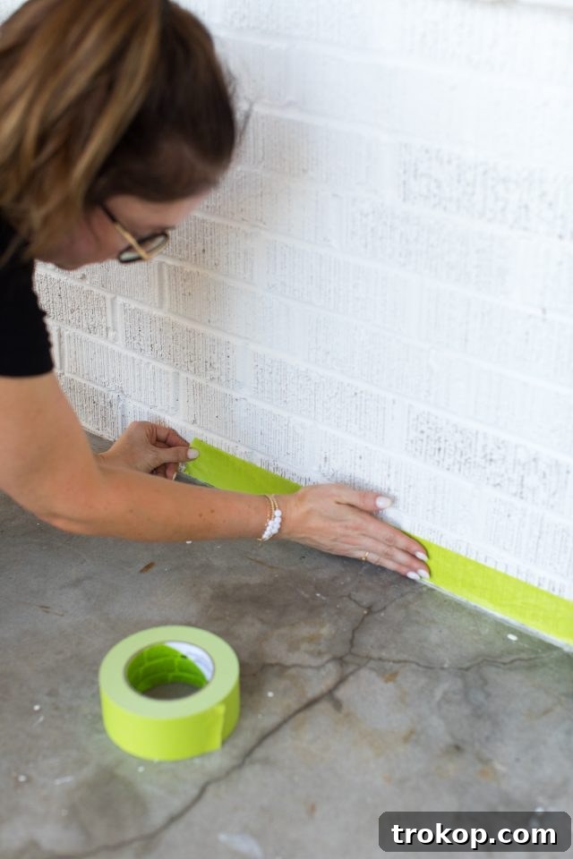Easy Porch Paint Job Instant Home Improvement 6 how to paint a porch - using hgtv scotch tape for our porch makeover by sugar & cloth