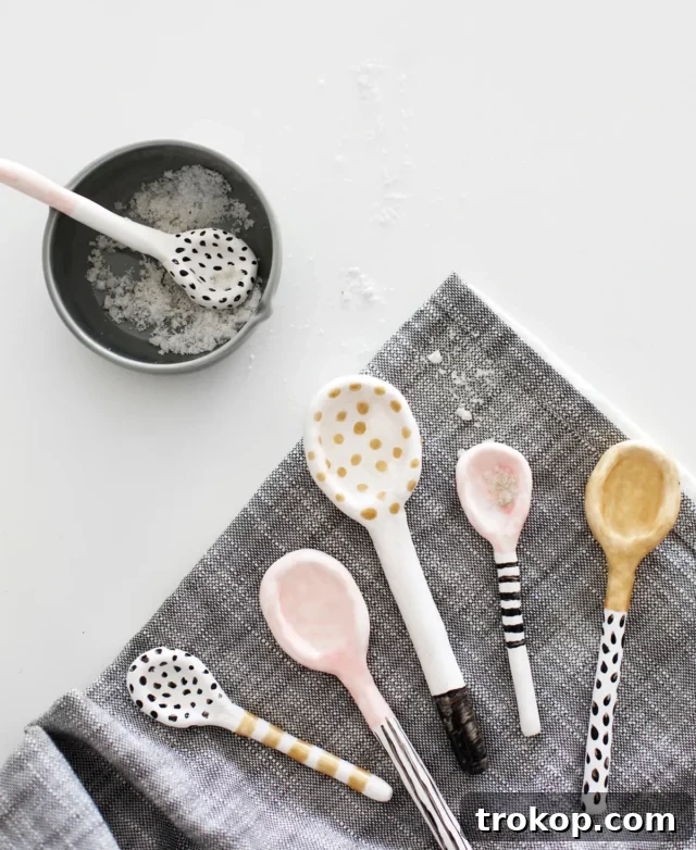 Crafting with Air Dry Clay 30 Ideas for Kids and Grown Ups 6 How to make clay salt spoons, showing finished spoons with painted measurements.