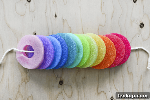 Cutting pool noodles into slices on a mat