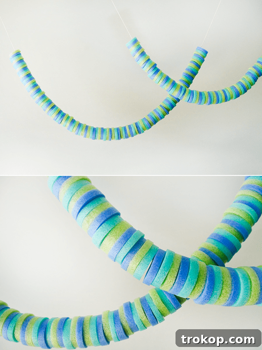 Completed DIY Pool Noodle Garland hung as a decoration