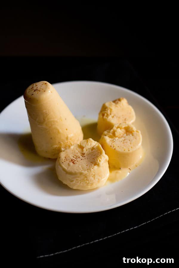 Mango Kulfi, a rich, creamy frozen dessert.