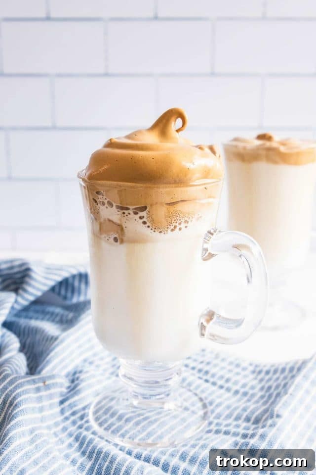 Photo of whipped coffee served hot by top Houston lifestyle blogger Ashley Rose of Sugar & Cloth