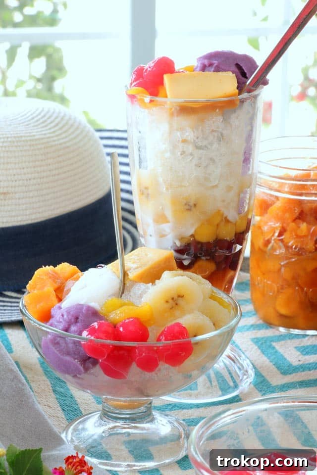 Halo Halo recipe for asian dessert recipes, featuring layers of ube, beans, fruit, and ice cream.