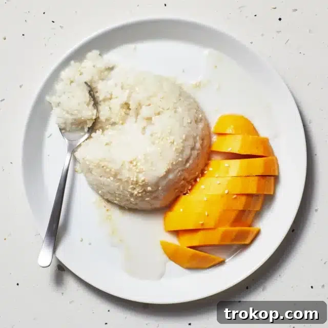 Mango Sticky Rice Recipe for Asian Dessert Recipe, with fresh mango slices.