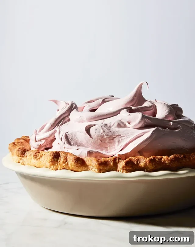 Crave-Worthy Peanut Butter Desserts You Need to Bake 8 An elegant peanut butter cream pie topped with light pink raspberry meringue swirls.