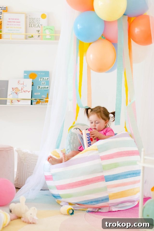 17 Playroom Gems: Fun and Adorable Ideas for Kids 18 Sharing how to make this DIY book nook with a few colorful reading nook ideas to make it your own! #decor #kids #diy #reading by top Houston lifestyle blogger Ashley Rose of Sugar & Cloth