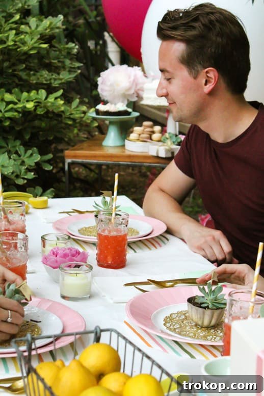 Craft Your Own Scalloped Tablecloth 3 A beautifully decorated table for a Martha Stewart-inspired dinner party, showcasing a handmade DIY scalloped tablecloth by Sugar & Cloth. The elegant table setting emphasizes celebration decor and personal touches.
