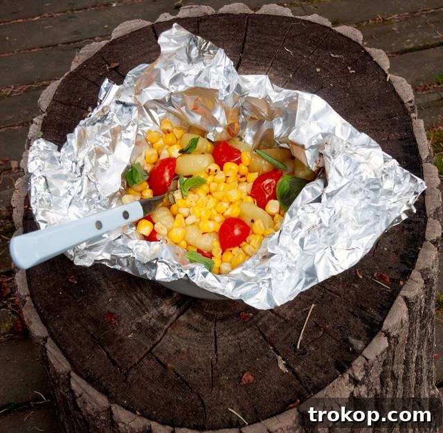 Gnocchi Foil Packs with corn and tomatoes, perfect for grilling