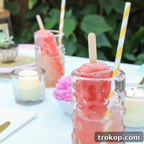A clever lemonade popsicle cocktail recipe for summer parties and refreshing enjoyment.