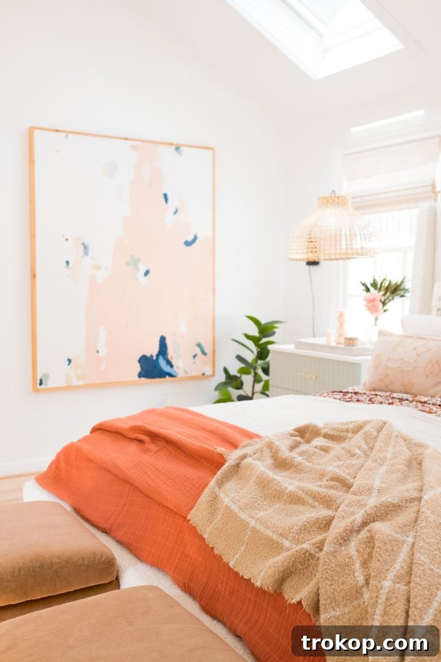Full view of the transformed cottage bedroom, emphasizing the spaciousness and brightness achieved through renovation.